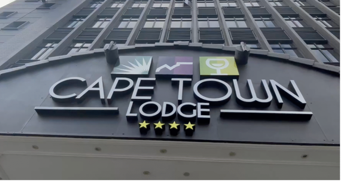 CPT Lodge Hotel entrance logo